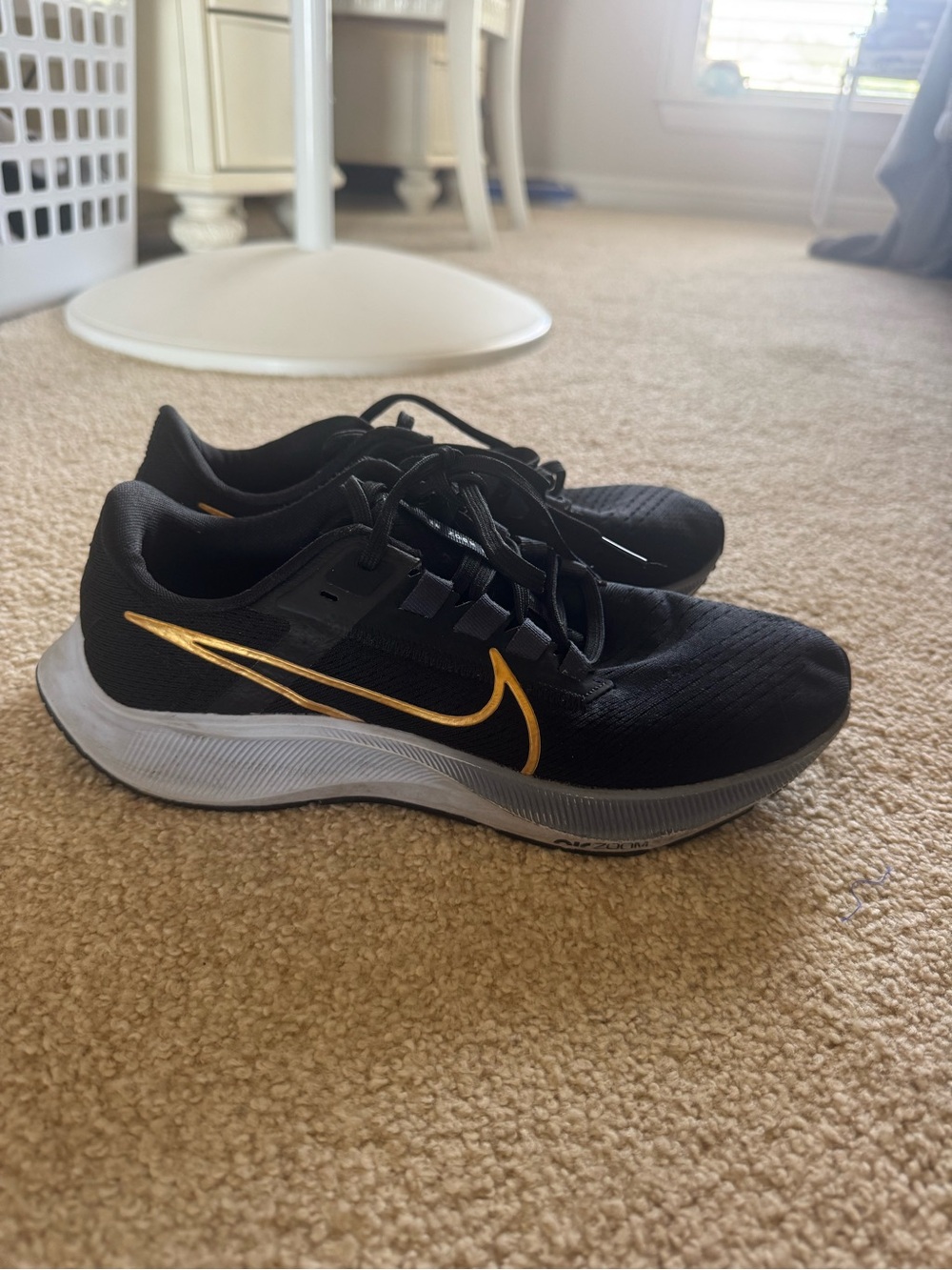 Nike Women’s Black and Gold Pegasus Running Sneakers